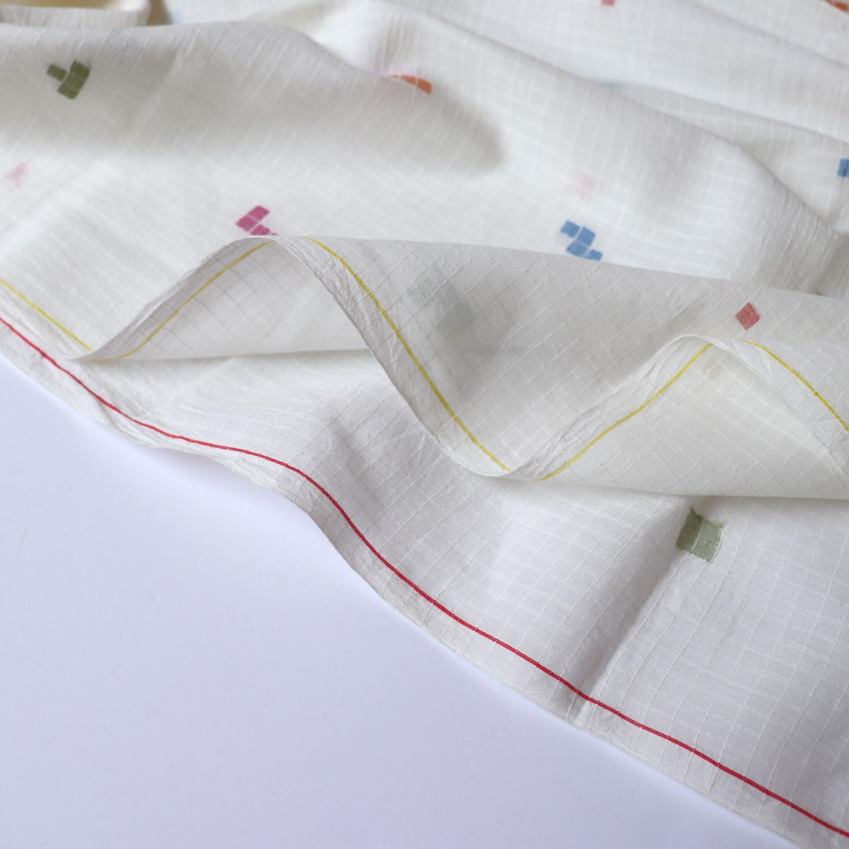 white jamdani cotton fabric with colorful geometric weave