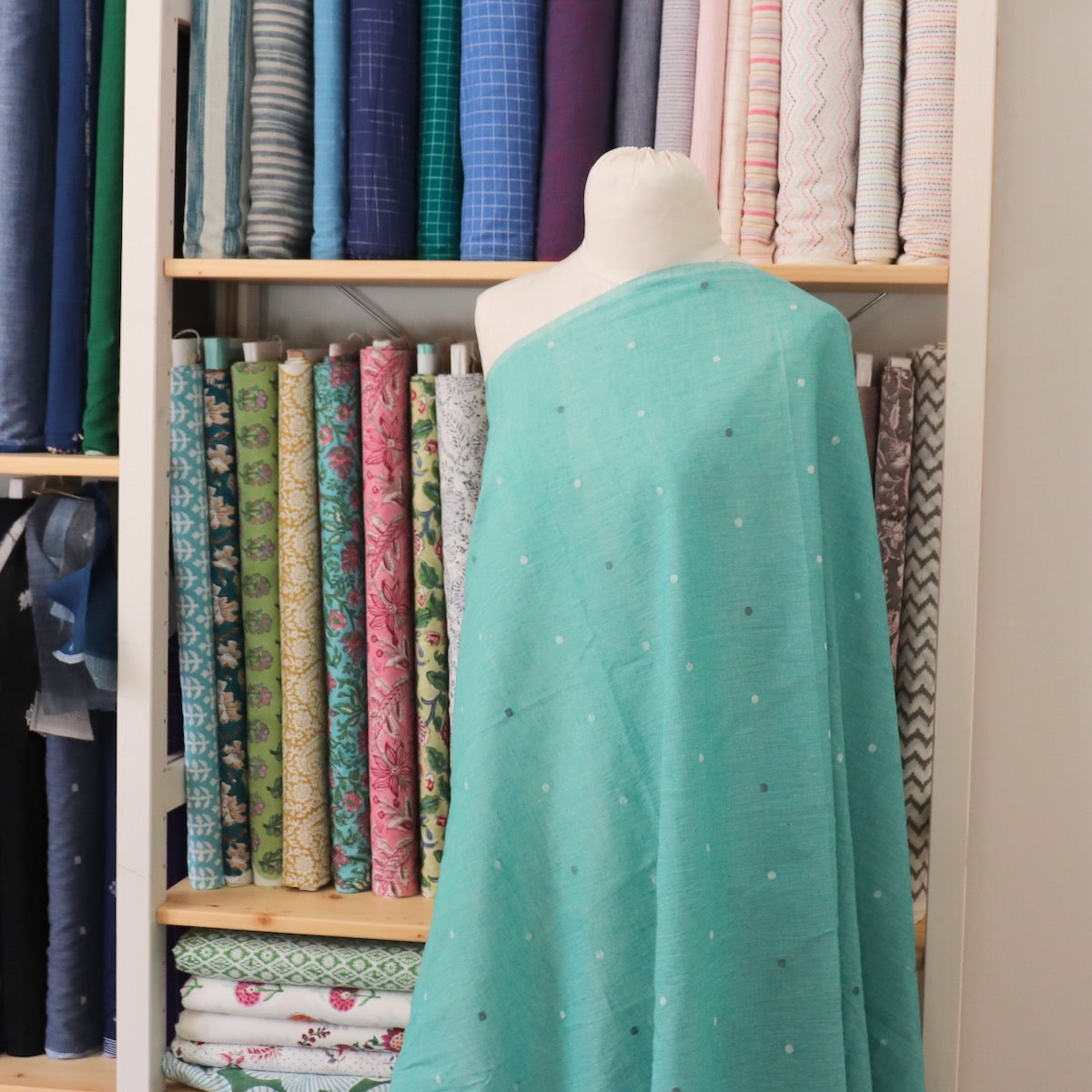 green jamdani cotton shot handloom fabric with white dots