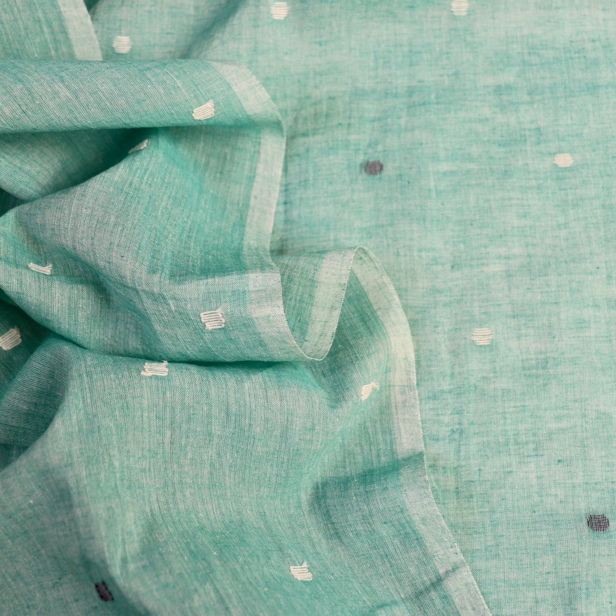 green jamdani cotton shot handloom fabric with white dots