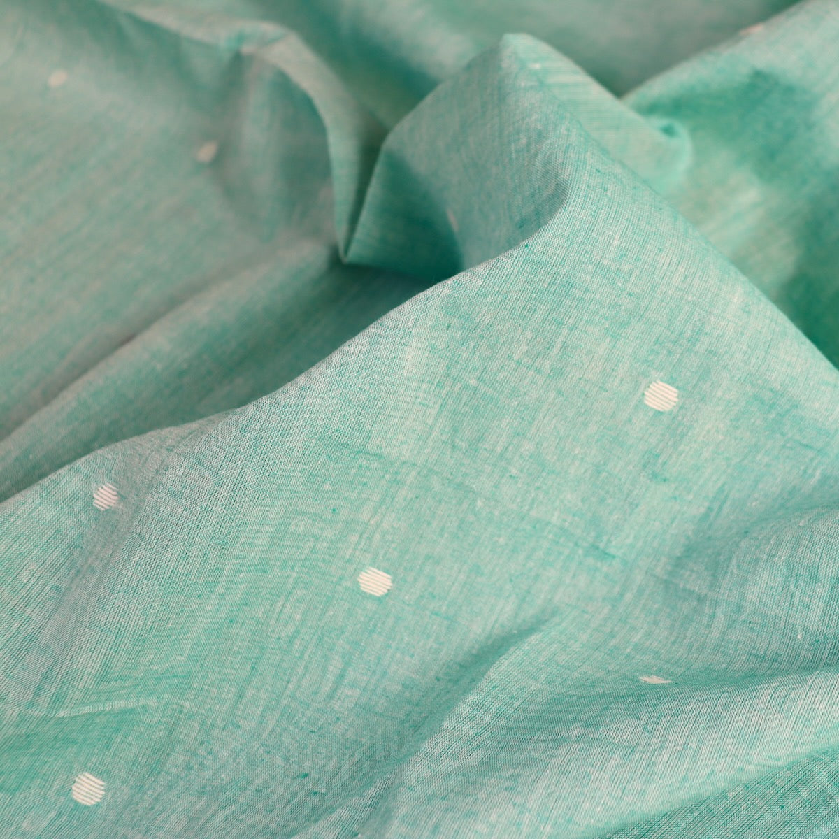 green jamdani cotton shot handloom fabric with white dots