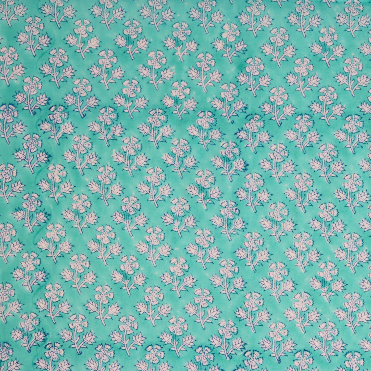small turquoise floral hand printed cotton fabric for quilting and dressmaking