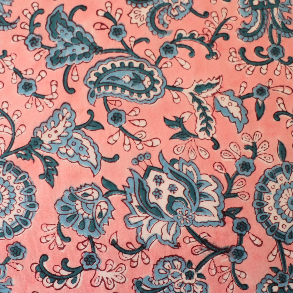 bright pink hand block print fabric with blue paisley design indian cotton