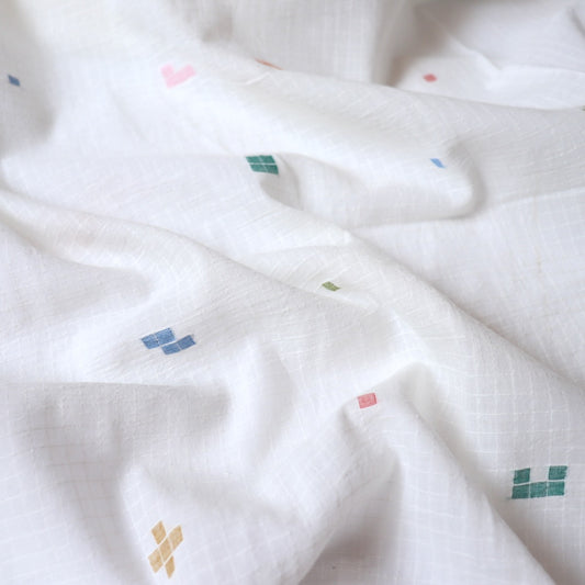 white jamdani cotton fabric with colorful geometric weave