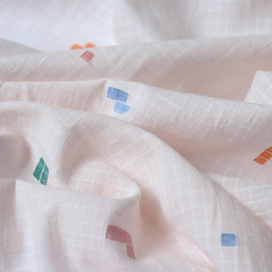 pink jamdani cotton fabric with colorful geometric weave