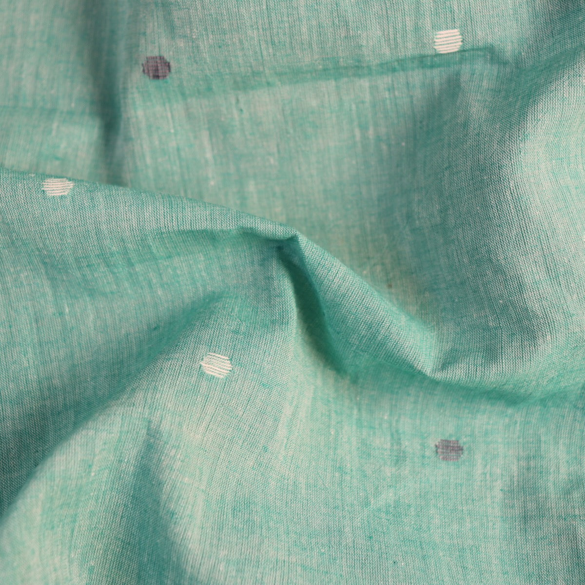 green jamdani cotton shot handloom fabric with white dots