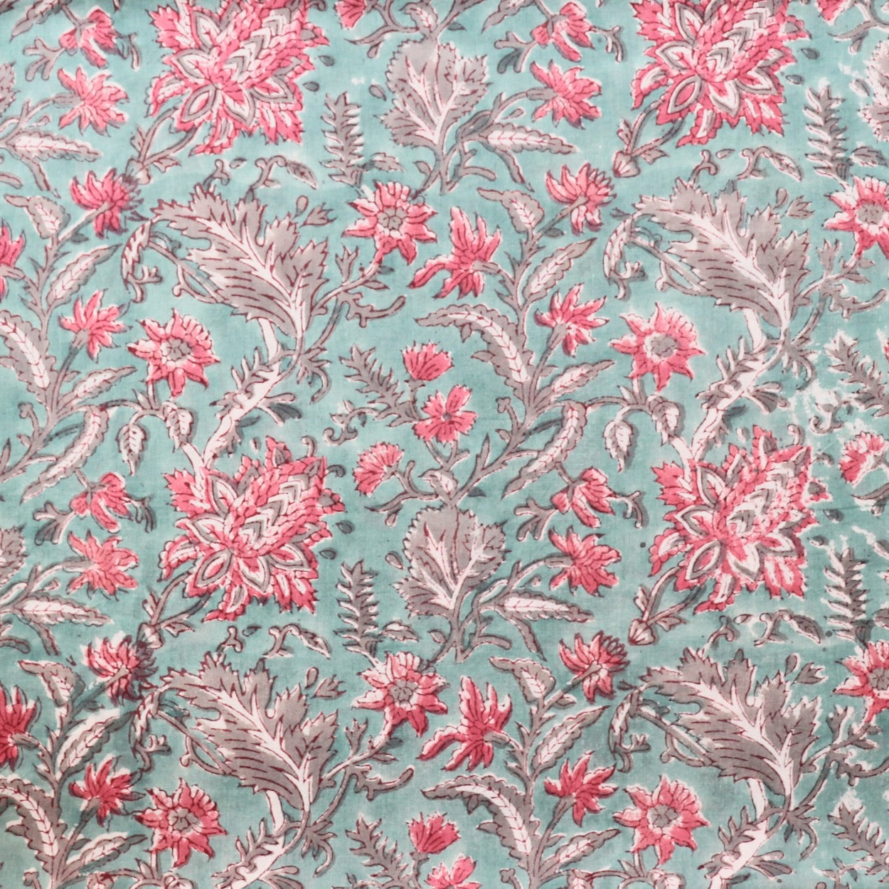 aqua blue hand block print fabric with pink flowers