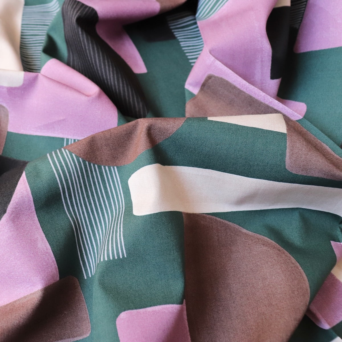 Japanese cotton print fabric with colorful geometric shapes green and pink