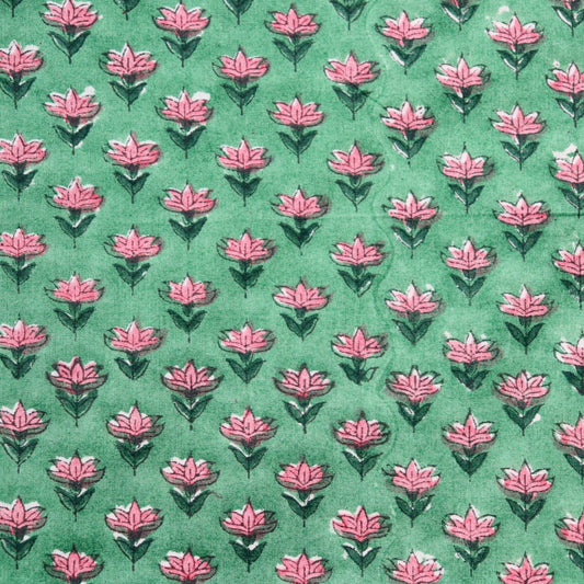 tiny pink floral hand block print fabric on bright green cotton