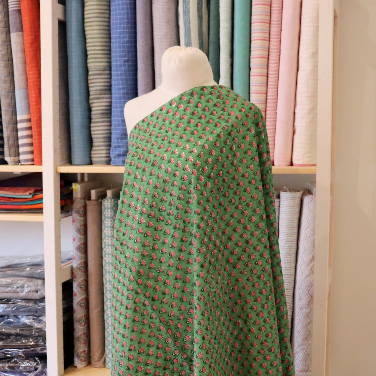 tiny pink floral hand block print fabric on bright green cotton