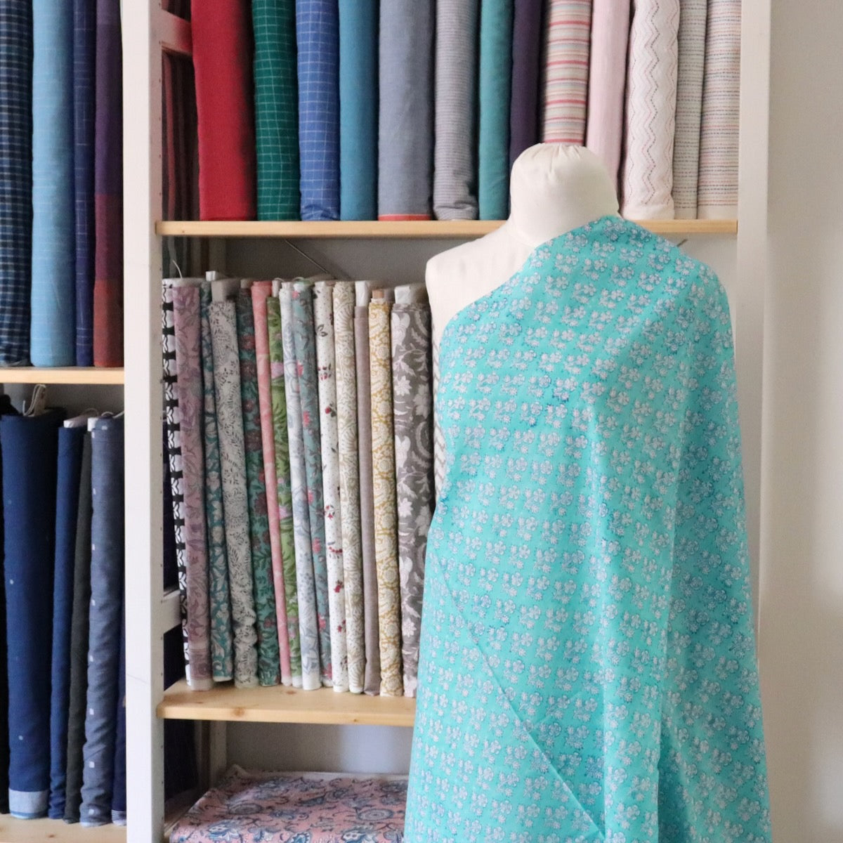 small turquoise floral hand printed cotton fabric for quilting and sewing