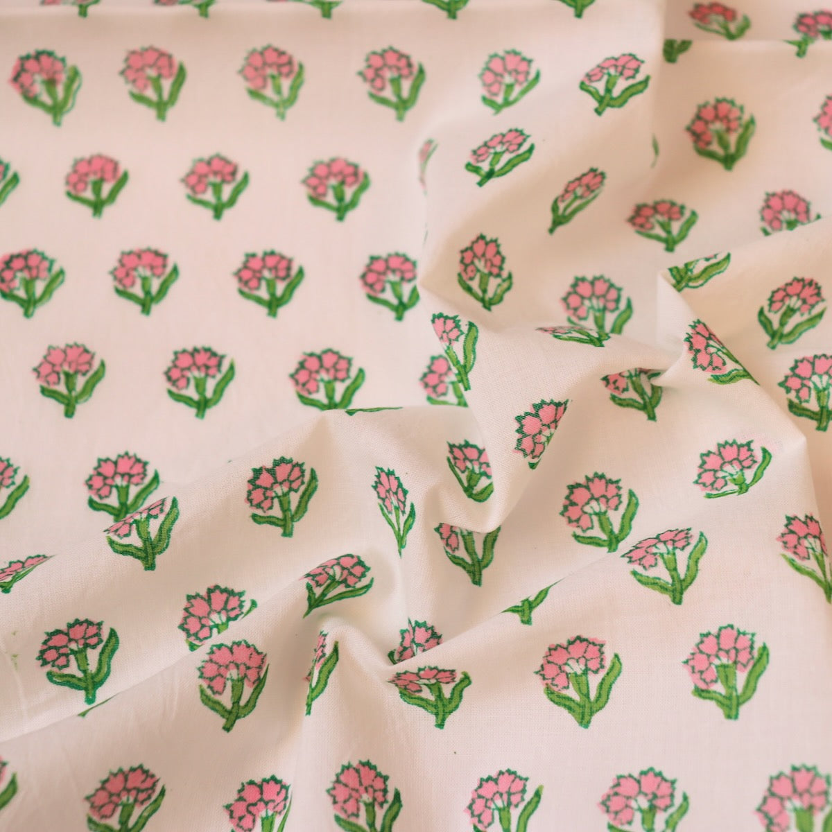 pink and white tiny floral fabric hand printed on soft cotton