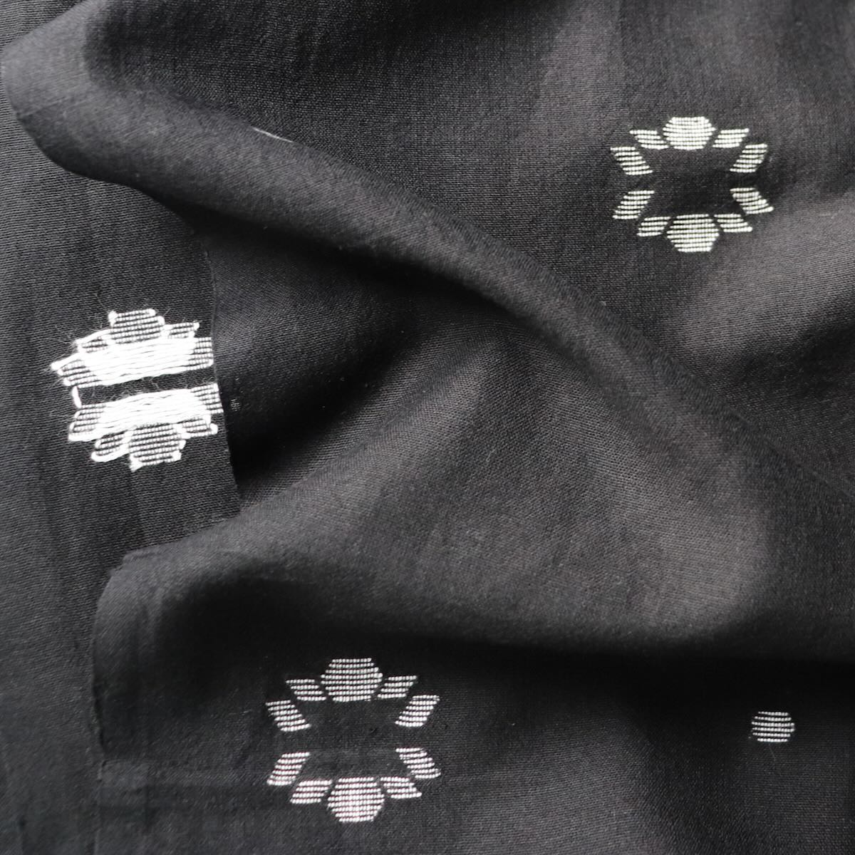 black and white jamdani floral weave fabric