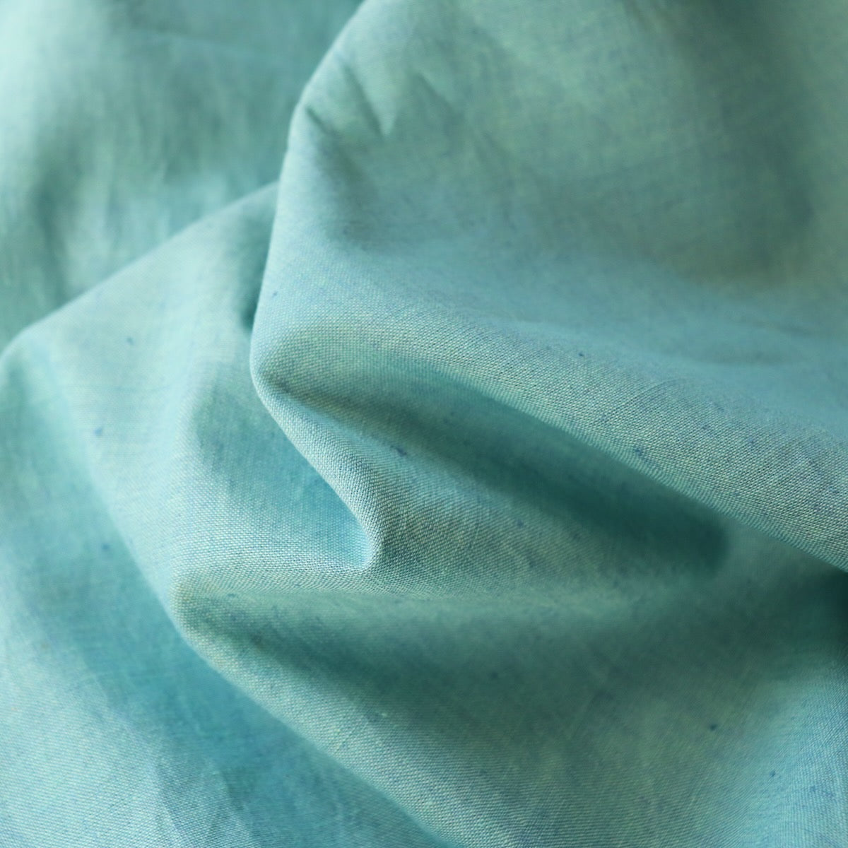 blue green shot cotton handwoven peppered fabric 