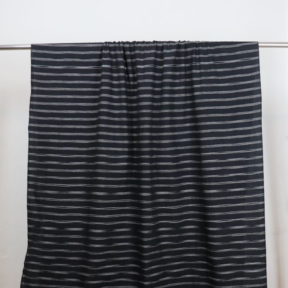 black ikat dyed horizontal stripe shirtmaking fabric