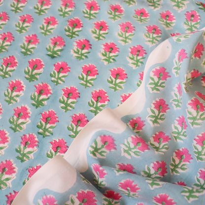 pink and blue floral hand block printed cotton fabric for sewing and quilting