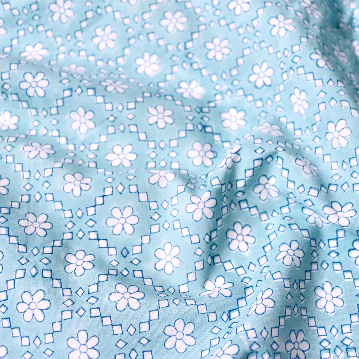 aqua blue with white flowers hand printed cotton fabric for sewing and quilting