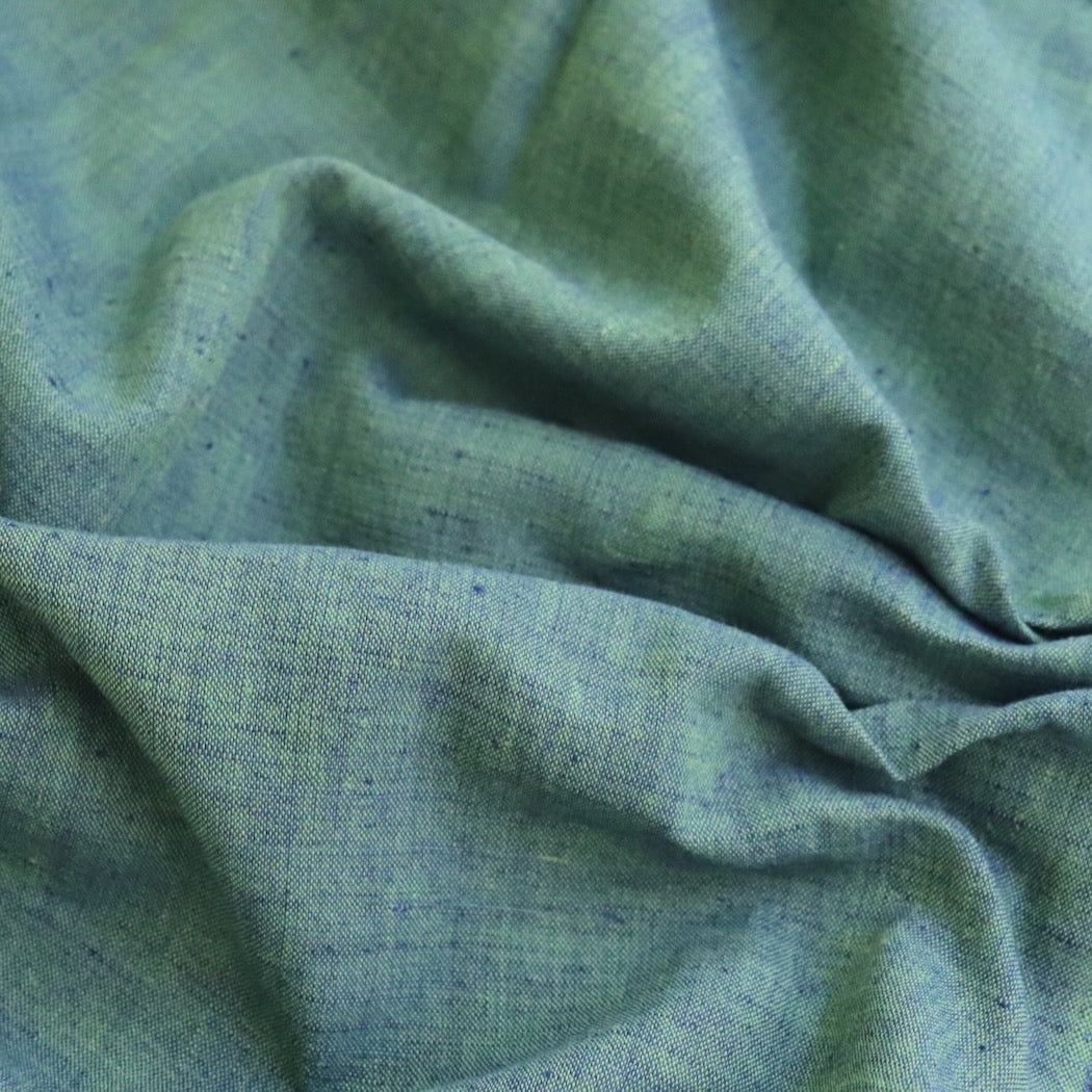 blue green shot peppered cotton fabric