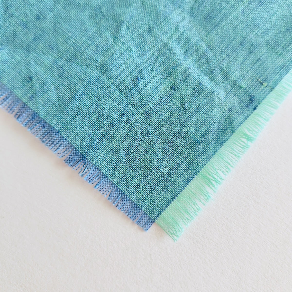 blue green shot cotton handwoven peppered fabric 