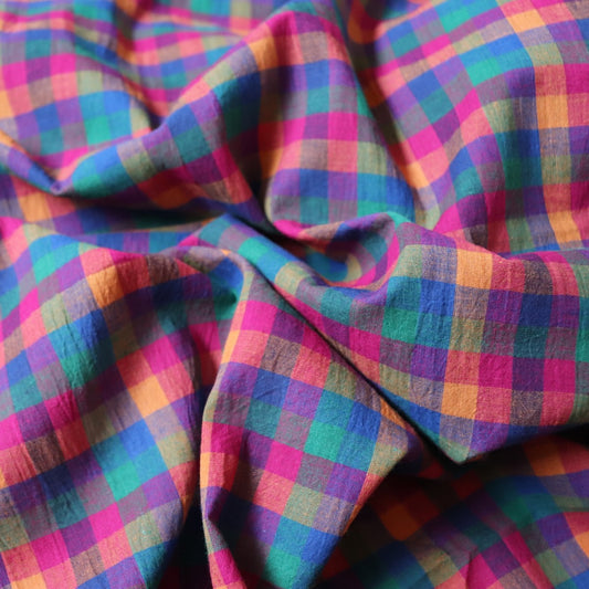 handwoven cotton fabric in deep jewel tone colors for sewing shirts dresses and quilts