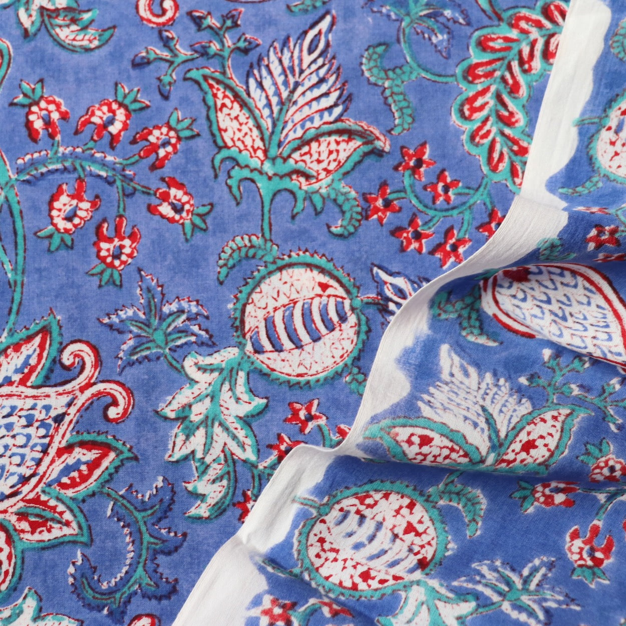 blue and red exotic floral hand block print cotton fabric yardage