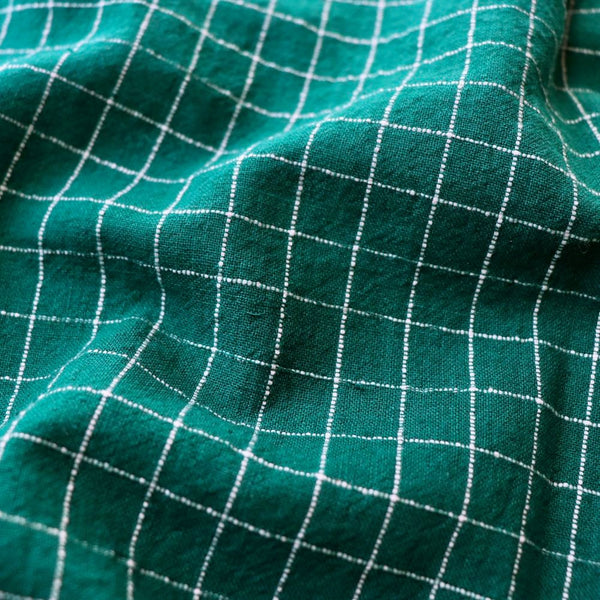 deep green and white check cotton dressmaking fabric