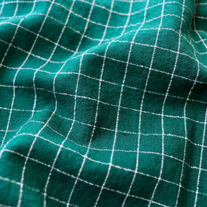 deep green and white check cotton dressmaking fabric
