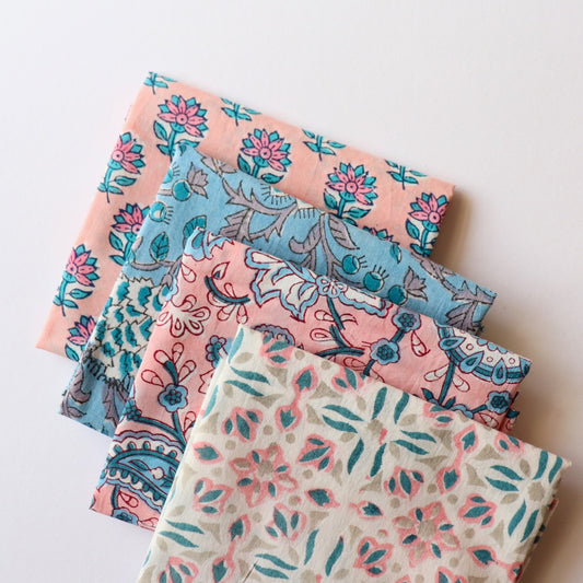 curated bundle of hand block print cotton fabrics light blue and pink