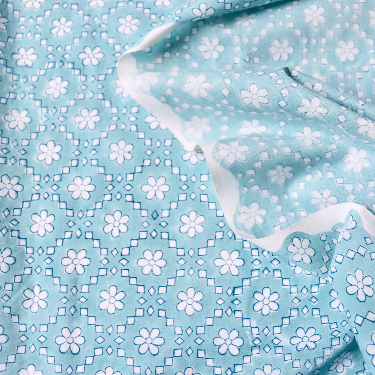aqua blue with white flowers hand printed cotton fabric for sewing and quilting
