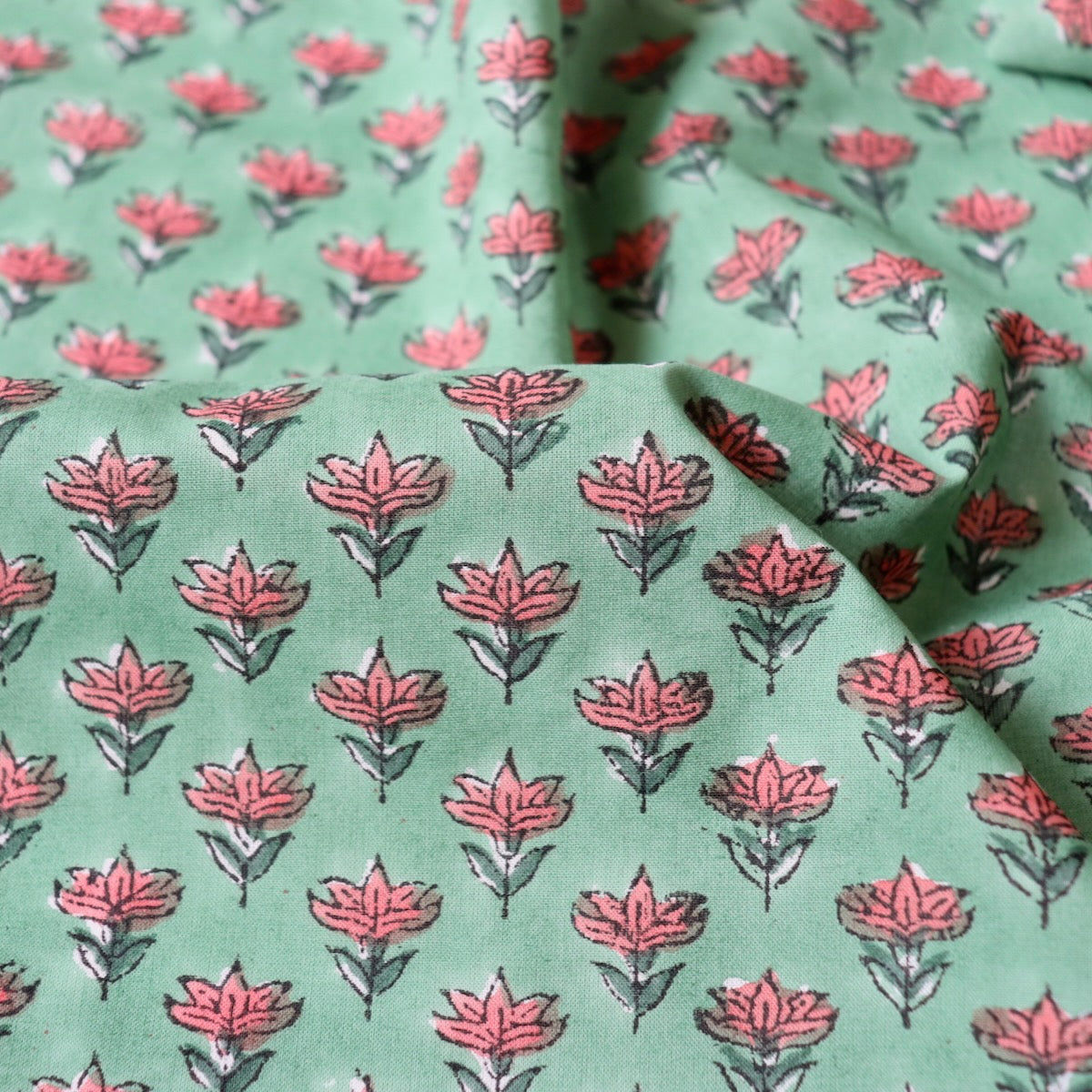 coral pink and green floral print cotton fabric hand block printed quilt material
