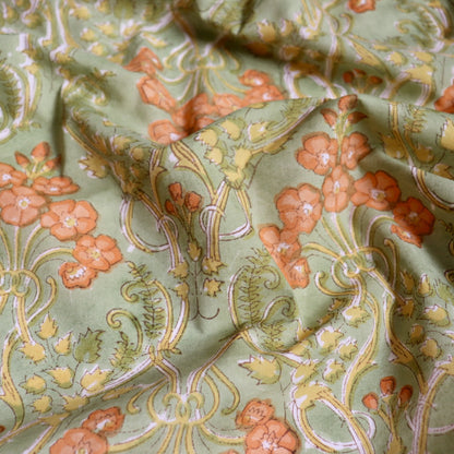 chartreuse floral fabric hand block printed on cotton art nouveau design