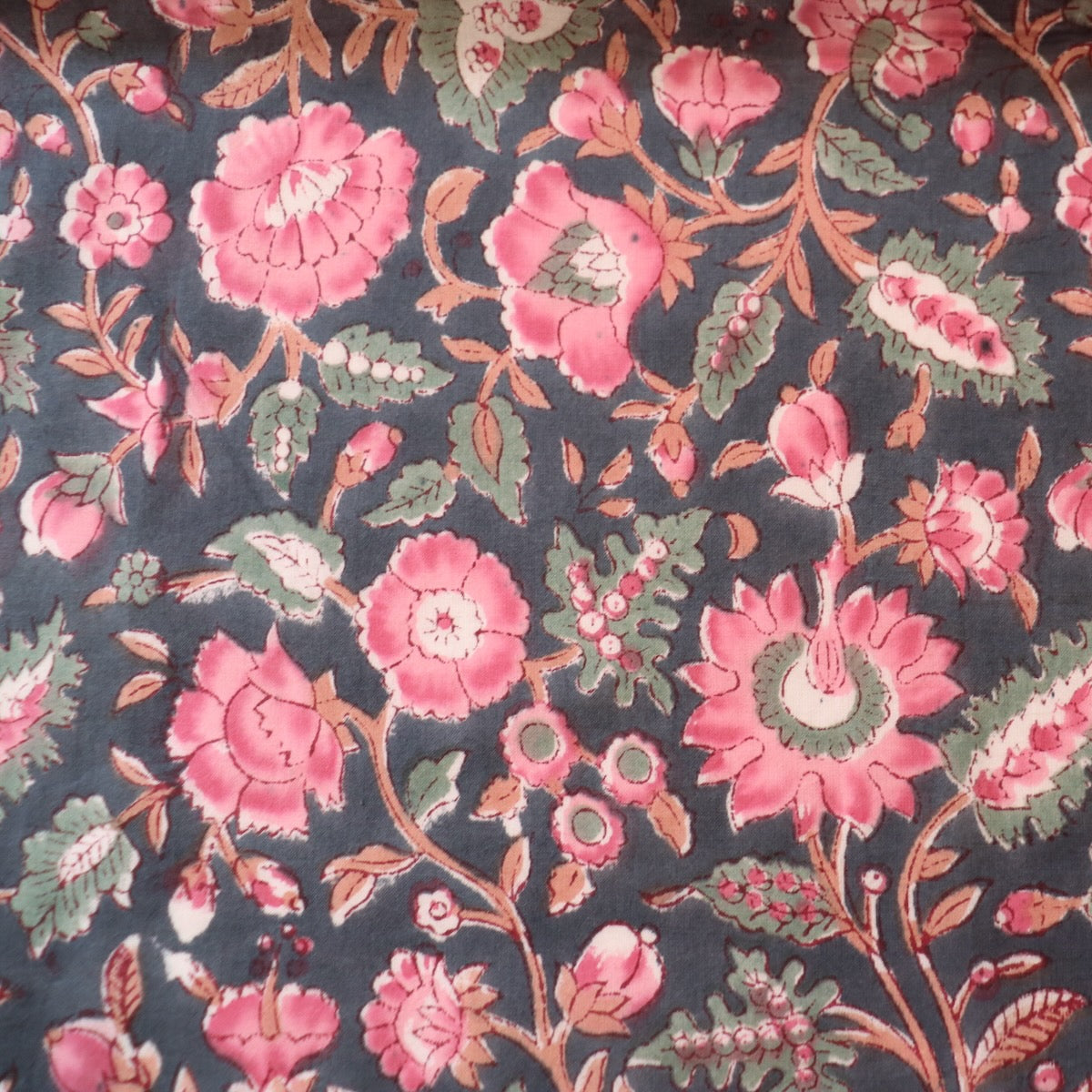 indian block print fabric pink flowers on charcoal gray cotton for quilting and dressmaking