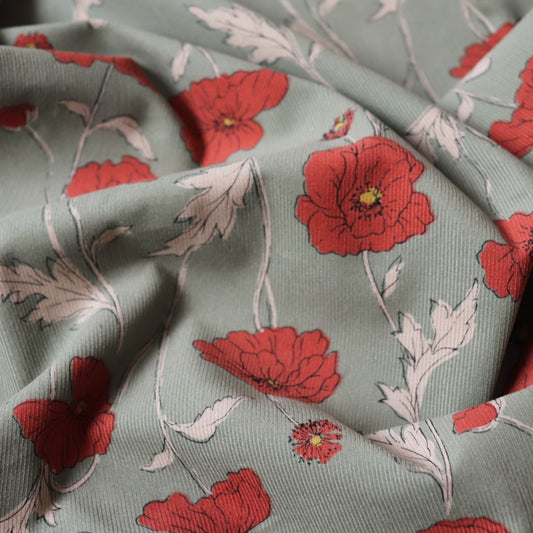 hokkoh poppies fabric cotton pinwale cord green and red-orange floral 