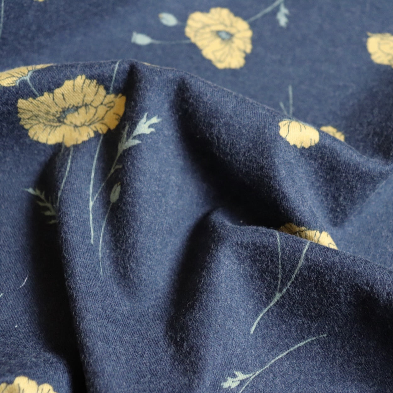 hokkoh poppy print fabric from japan brushed cotton flannel charcoal gray and yellow floral print