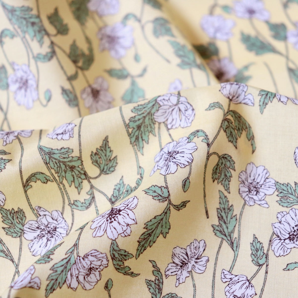 Hokkoh poppies cotton lawn light yellow with white floral print fine dressmaking fabric from Japan