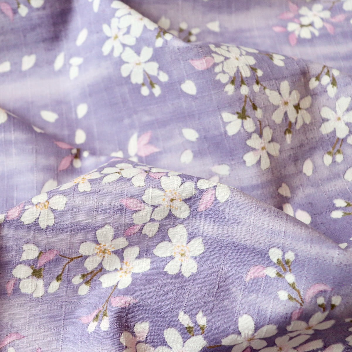 cherry blossom print cotton fabric made in Japan textured weave purple and white