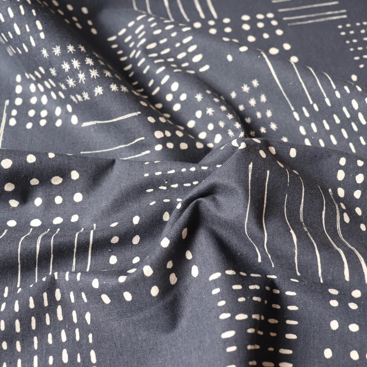 grey linen cotton canvas with white abstract dots and lines pattern made in Japan