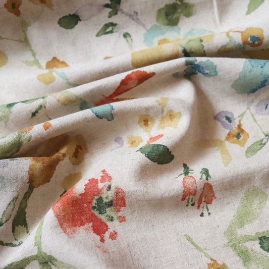flax-color linen cotton fabric from Japan with colorful watercolor-style floral print 