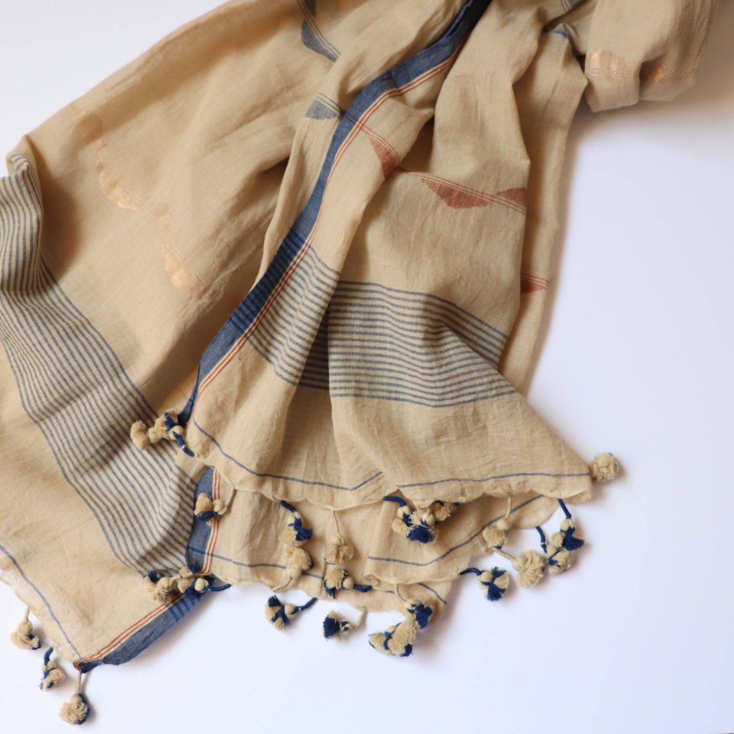 natural tea dyed handloom cotton scarf with indigo jamdani weave