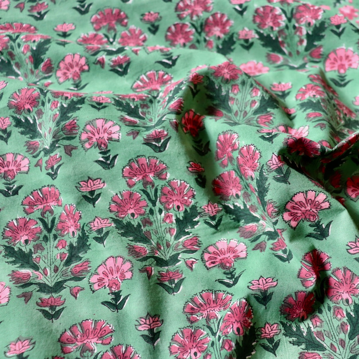 classic Indian floral block print, pink on green cotton fabric by the yard