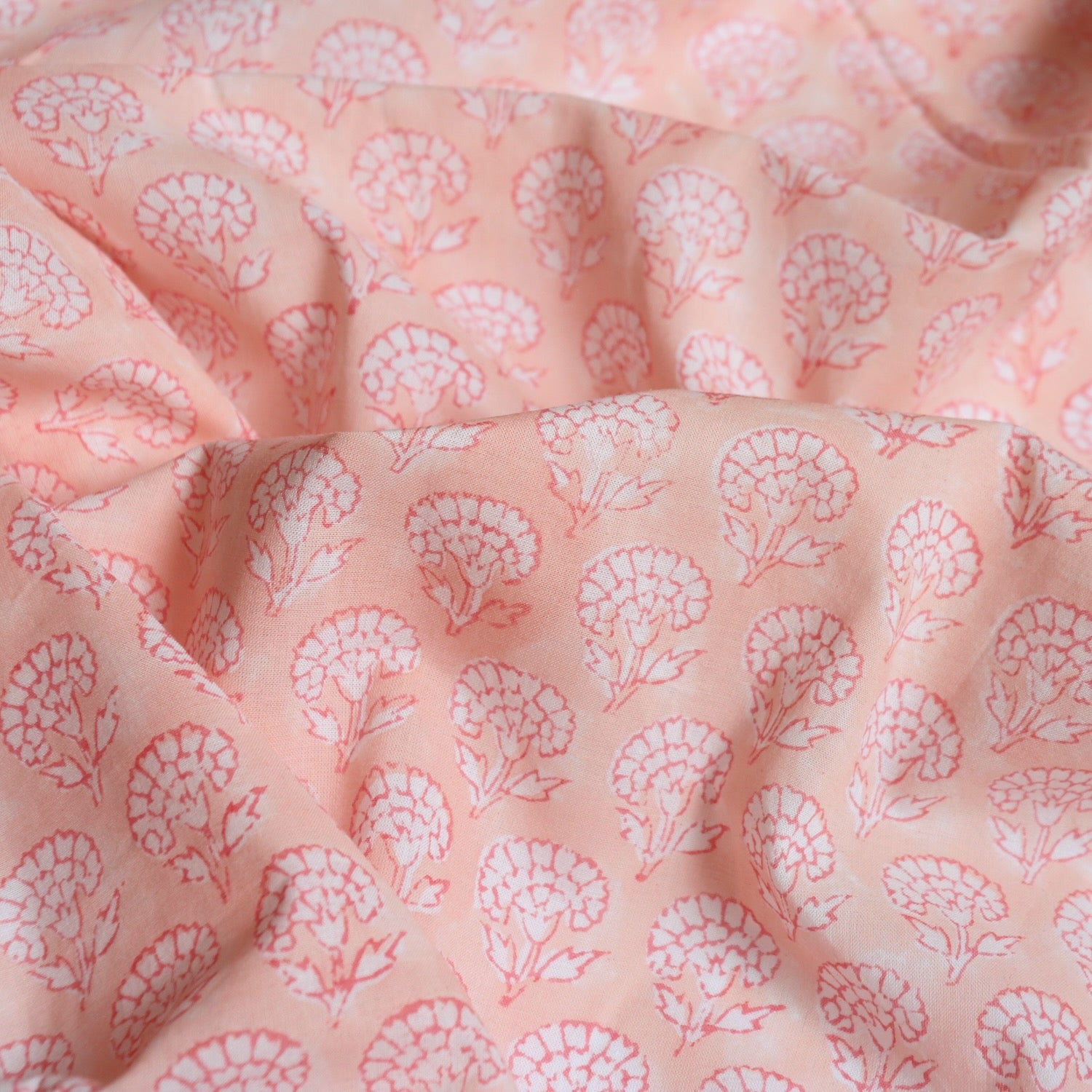 light pink block printed cotton fabric with small white floral print very soft fabric for sewing and historical dressmaking
