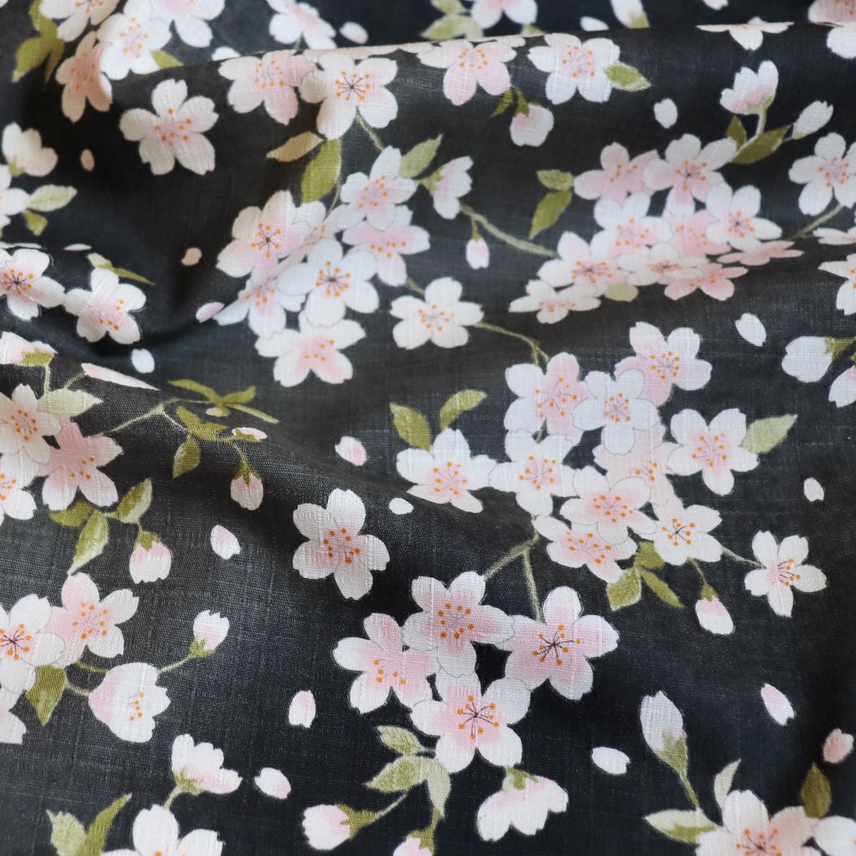 Japanese sakura print cotton dobby fabric grey with white and pink blossoms 