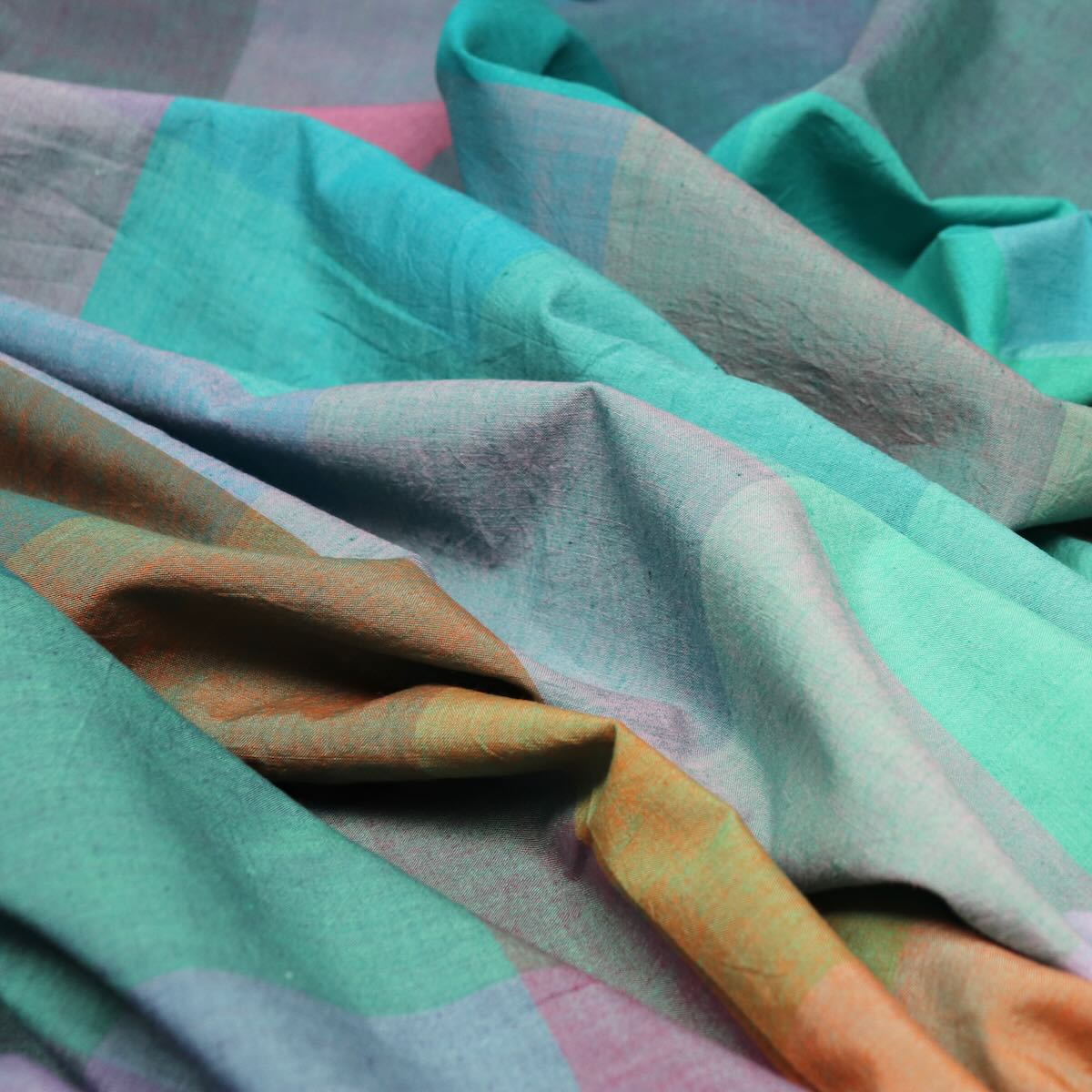 handwoven iridescent cotton fabric in rainbow colors