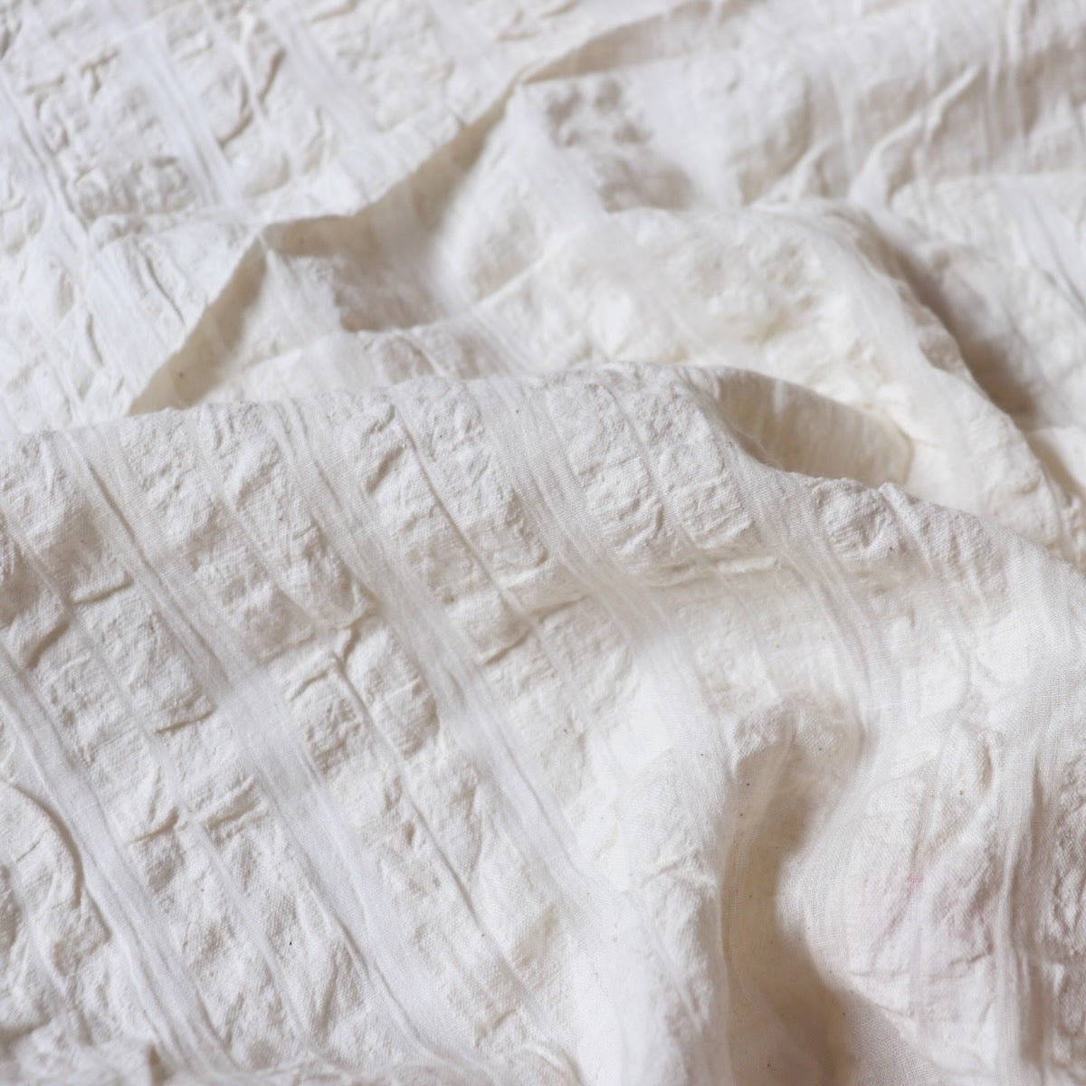 cotton seersucker fabric off-white handwoven stripe dress material made in India