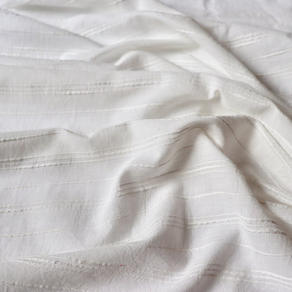soft white handwoven cotton fabric with textured slub stripe by the yard
