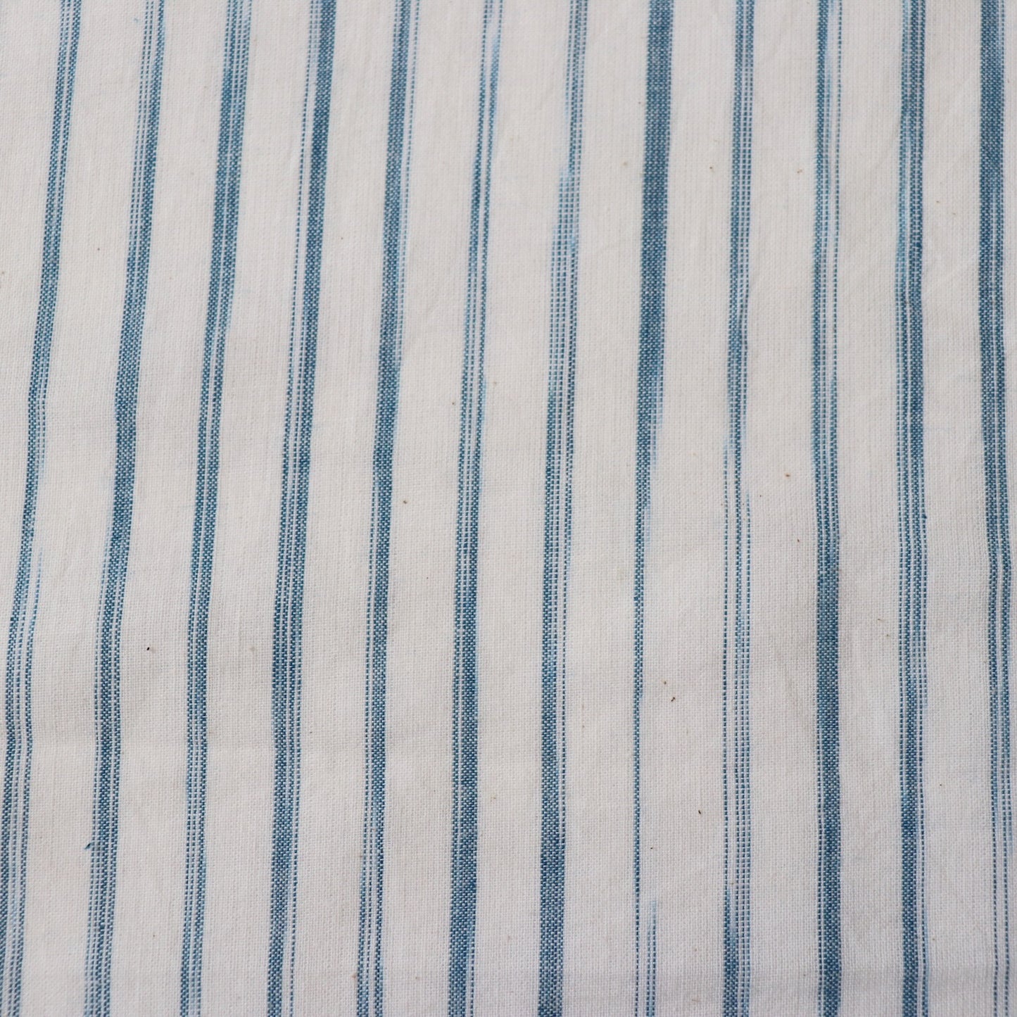 blue ikat stripe on white handloom cotton fabric by the yard