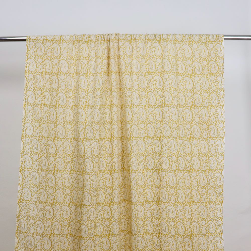yellow and white paisley design block print cotton fabric
