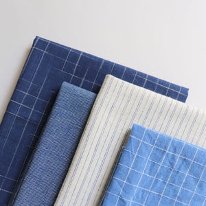 Four fat quarters in shades of blue