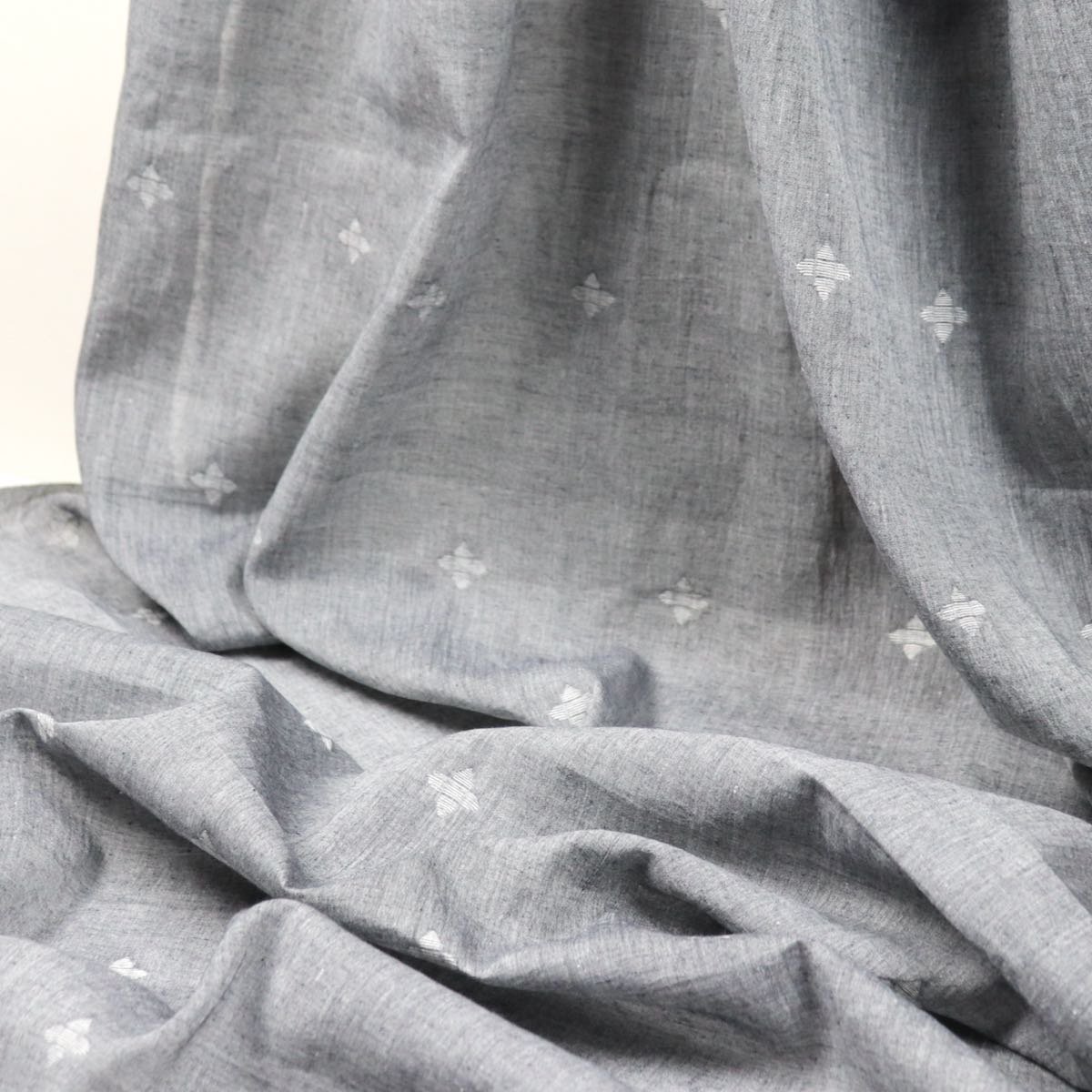 gray and white jamdani cotton fabric